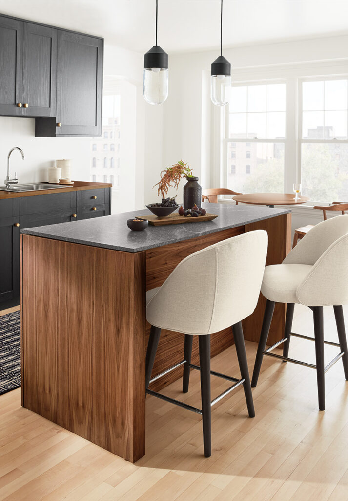 Amherst 60-wide Kitchen Island in walnut with Cora Swivel Counter Stool in Sumner Ivory.