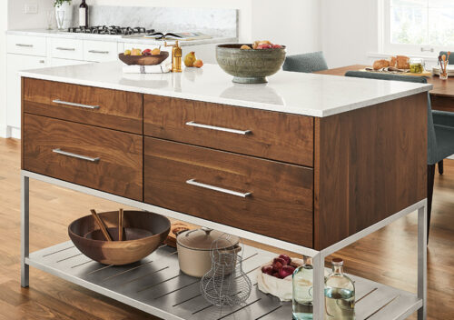 Kitchen with Booker kitchen island with shelves in walnut.