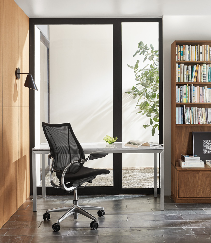 Room setting with Liberty Ocean office chair, Parsons table and Keaton bookcase.